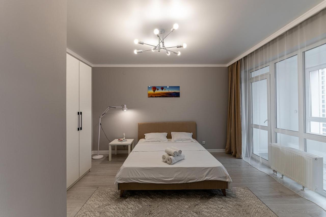 Apartamento Уютная 1 Комнатная Freedom Astaná Exterior foto